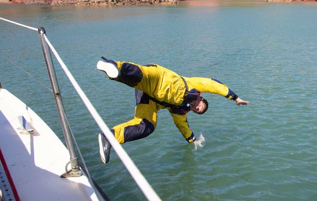 man slipping on boat deck
